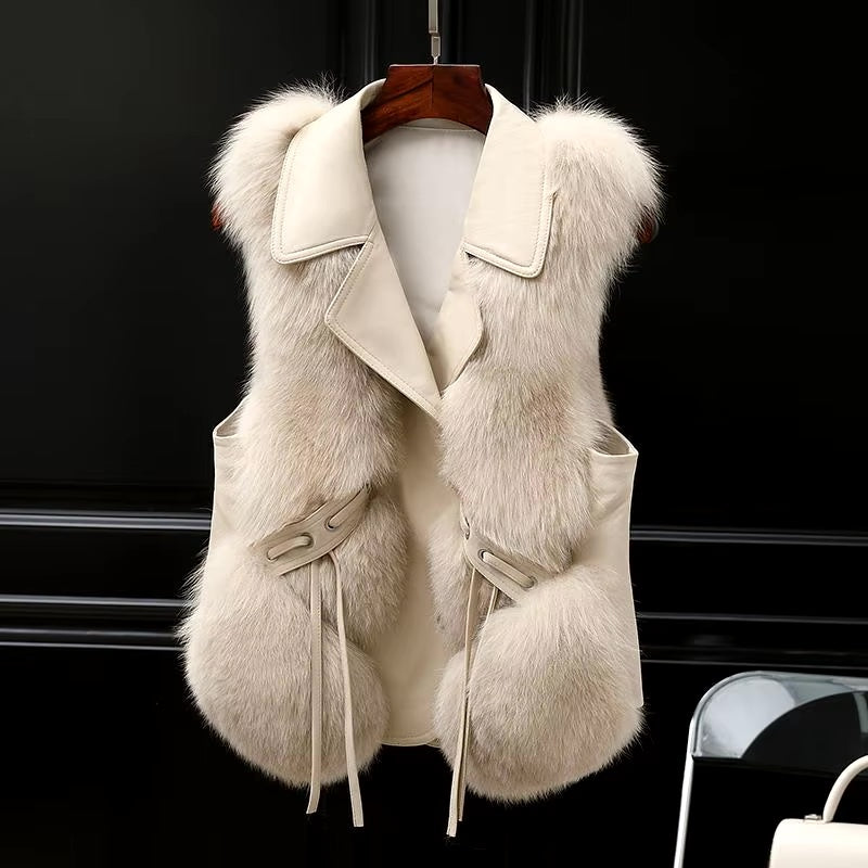 Oversized lapel winter gilet with adjustable waist tie detail for women | Empress