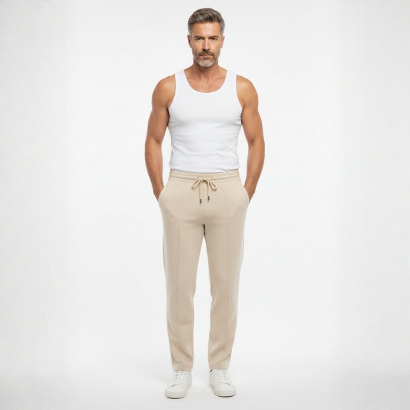 Relaxed fit knit drawstring pants with front seam detail for men | Solenne