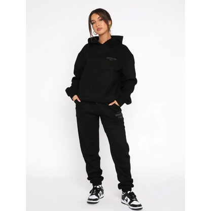 Relaxed fit tracksuit set with pullover hoodie and joggers for women | Aria