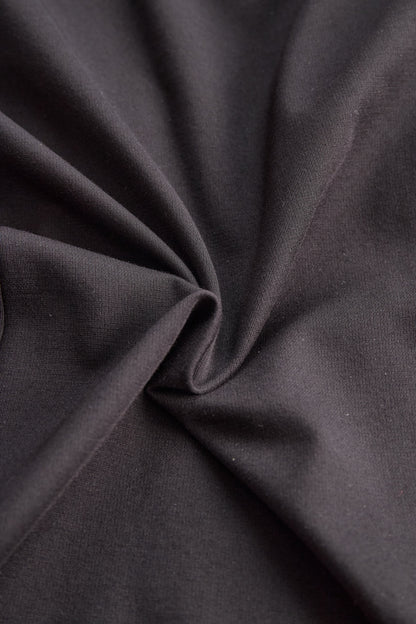 Stylish one-shoulder gown with metallic pleated detail for women | Aurelia Noire