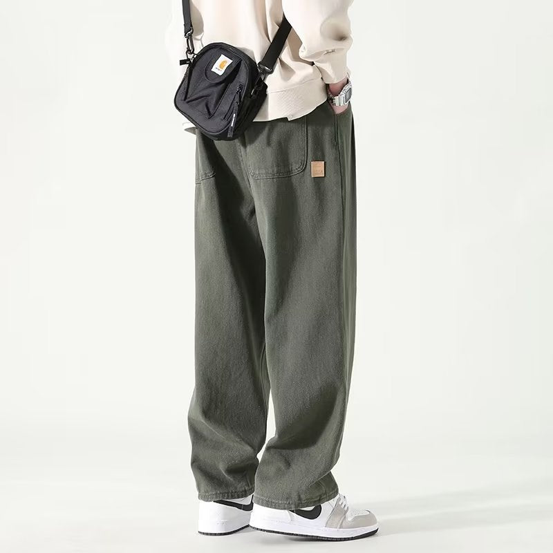 Wide leg relaxed pleated pants with stacked length for men | Corvane