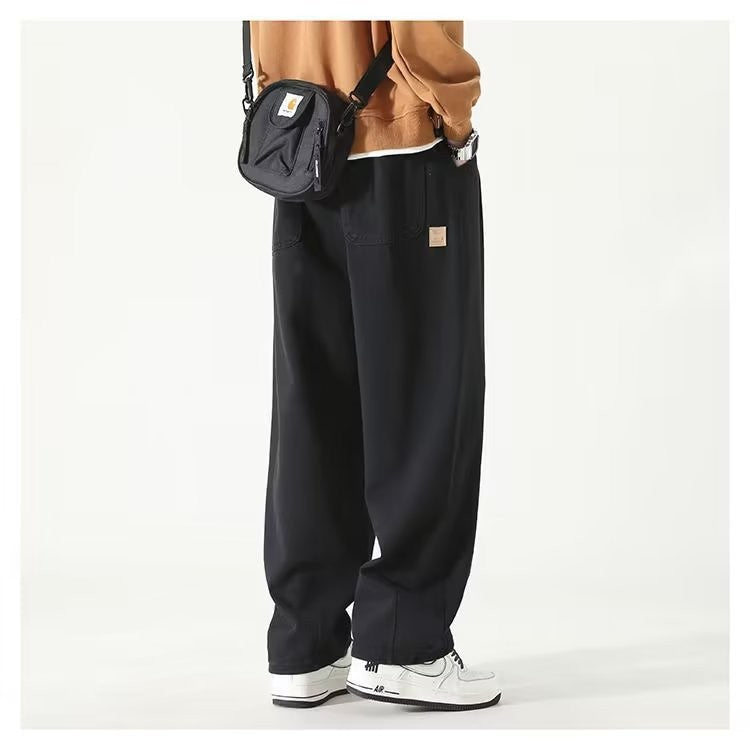 Wide leg relaxed pleated pants with stacked length for men | Corvane