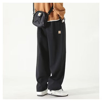 Wide leg relaxed pleated pants with stacked length for men | Corvane