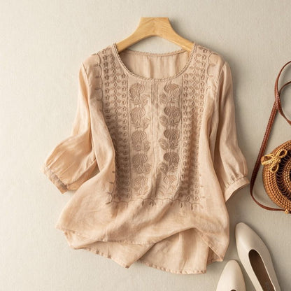 Floral embroidered high low hem linen blouse for women | Seraphine