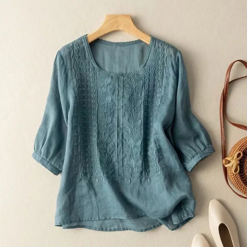 Floral embroidered high low hem linen blouse for women | Seraphine