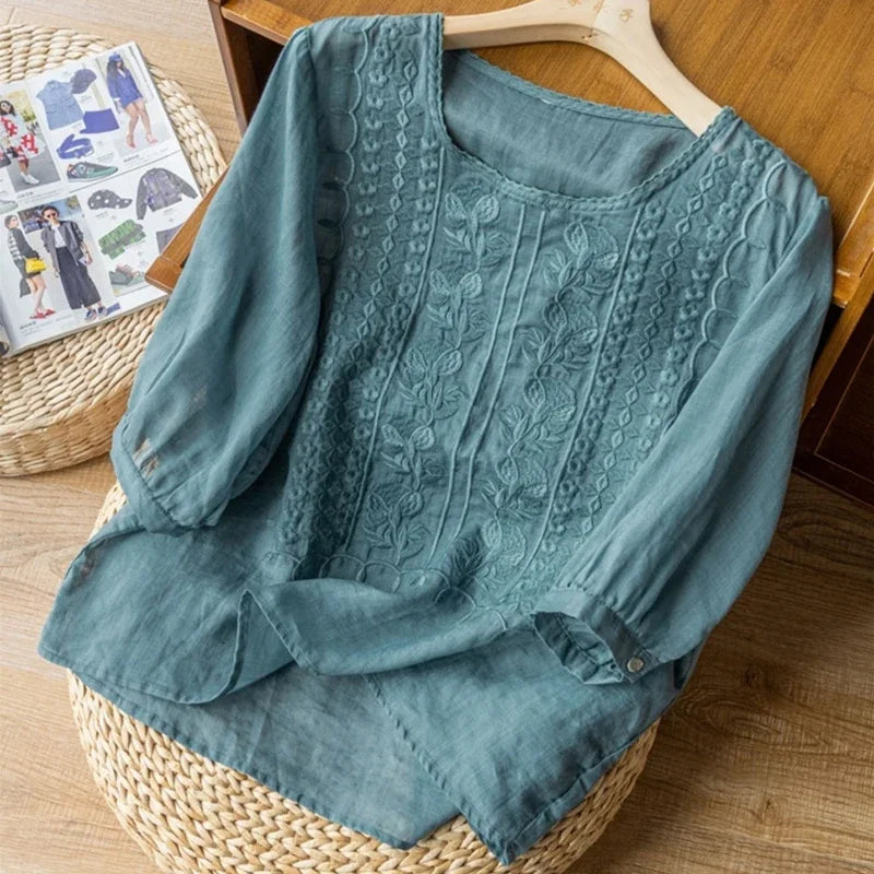Floral embroidered high low hem linen blouse for women | Seraphine
