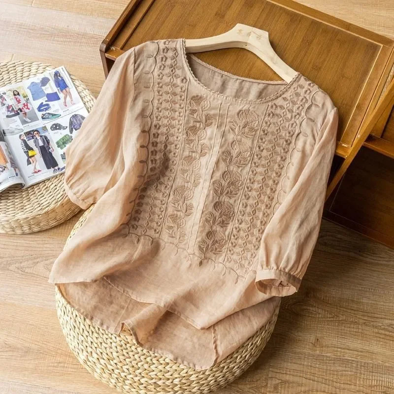 Floral embroidered high low hem linen blouse for women | Seraphine