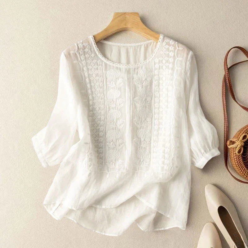 Floral embroidered high low hem linen blouse for women | Seraphine
