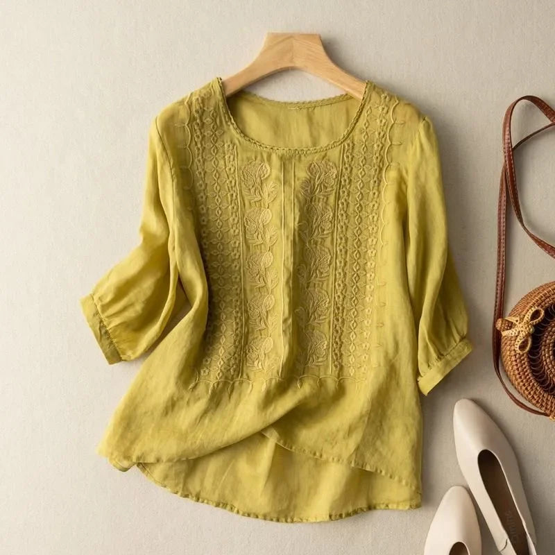 Floral embroidered high low hem linen blouse for women | Seraphine