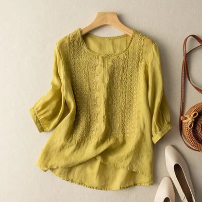 Floral embroidered high low hem linen blouse for women | Seraphine