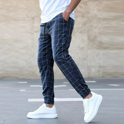 Checkered tapered jogger pants with elastic waistband detail for men | Crossmark