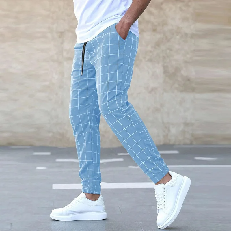 Checkered tapered jogger pants with elastic waistband detail for men | Crossmark