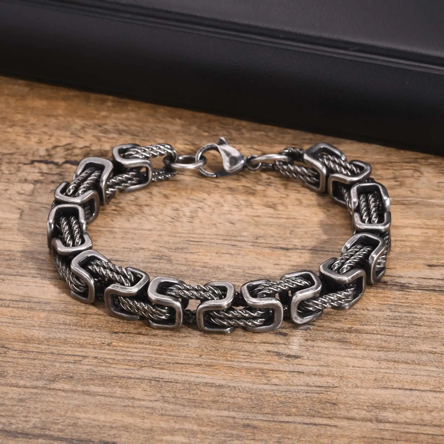 Forged chain cuff bracelet with woven link detail for men | Rogue