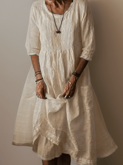 Relaxed midi dress with layered hem and three-quarter sleeves for women | Isolde