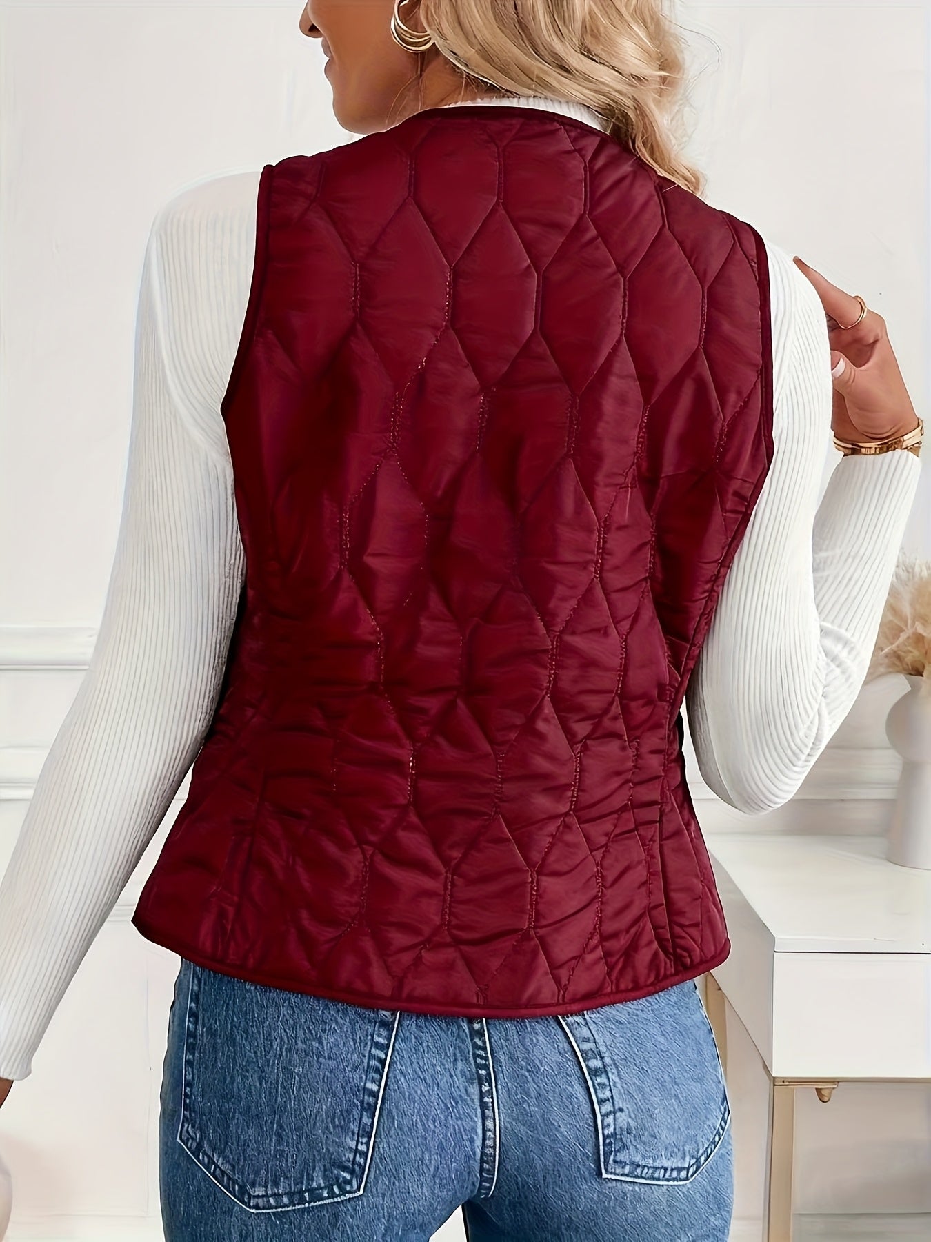 Quilted bomber vest with snap button front detail for women | Pique