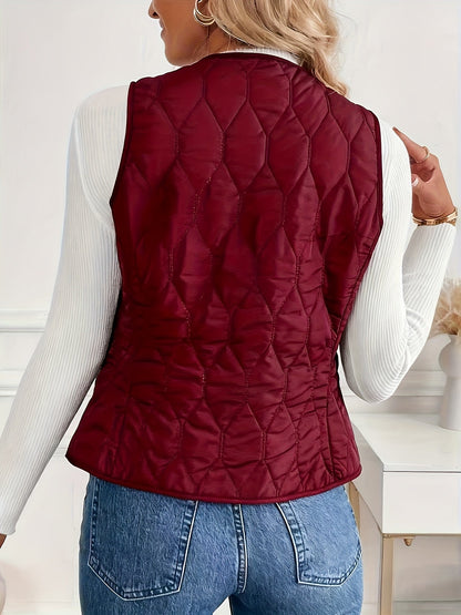 Quilted bomber vest with snap button front detail for women | Pique