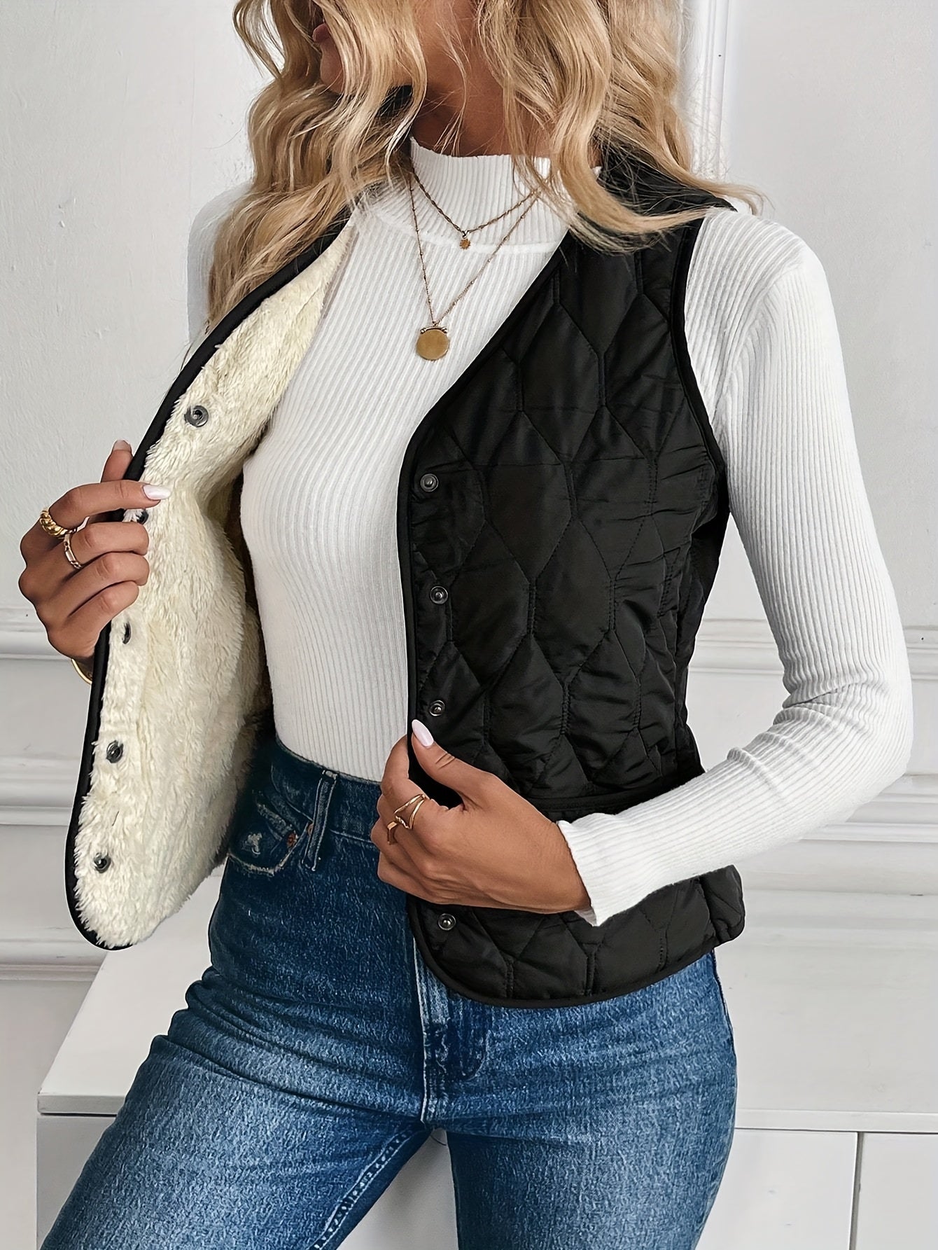 Quilted bomber vest with snap button front detail for women | Pique