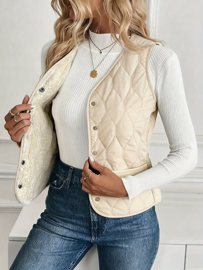 Quilted bomber vest with snap button front detail for women | Pique