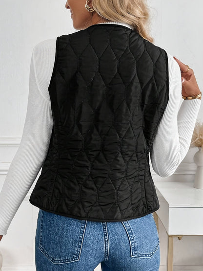 Quilted bomber vest with snap button front detail for women | Pique