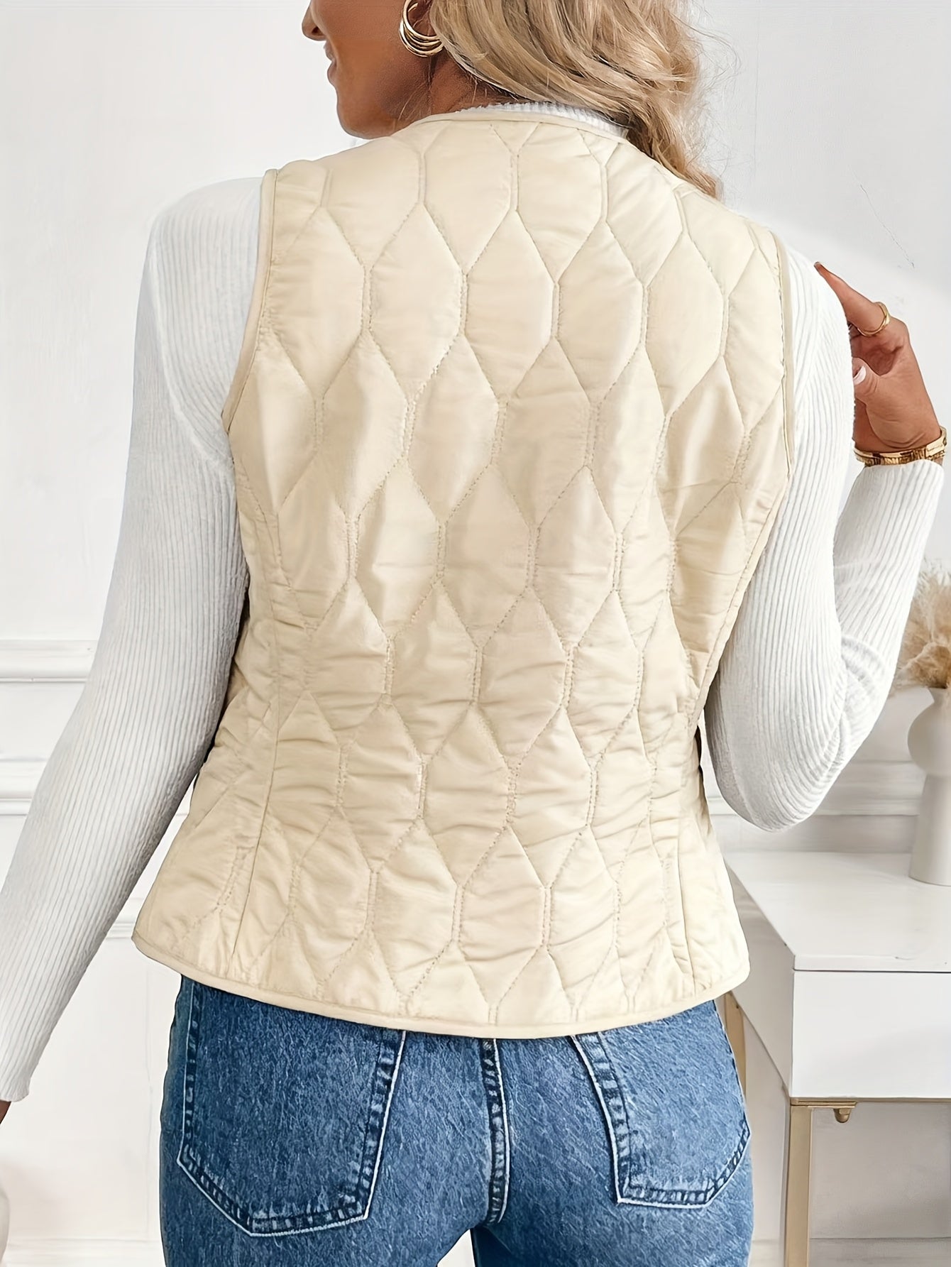 Quilted bomber vest with snap button front detail for women | Pique